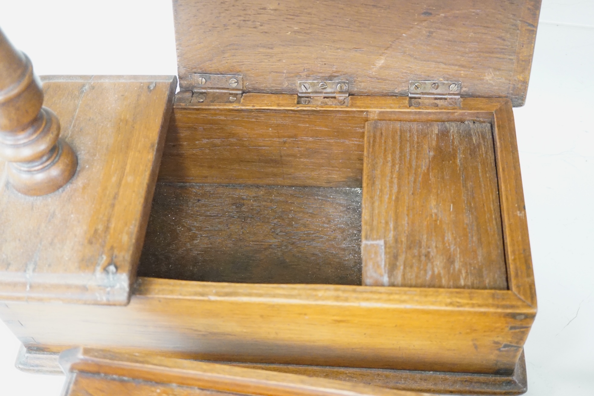 19th/early 20th century woodenware to include Pitcairn Islands circular box and treen ‘cat’ or plate stand, largest 44cm wide. Condition - fair to good